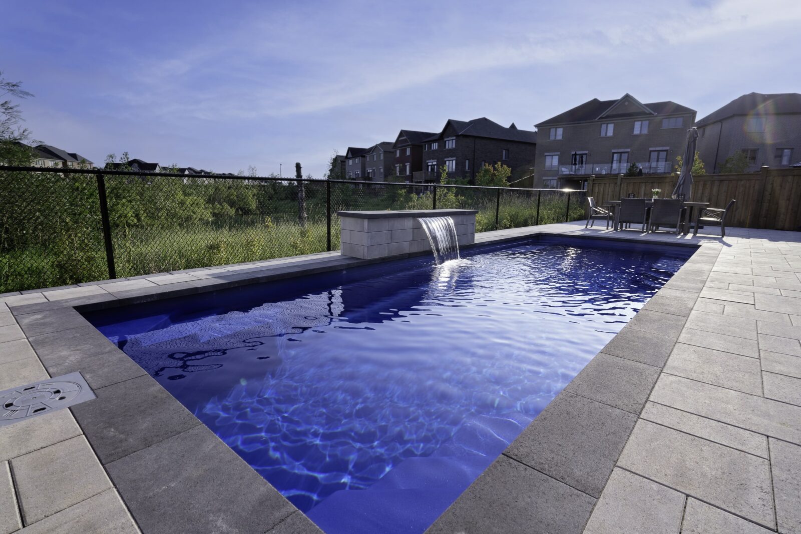 rectangular pool with fountain in Milton, Ontario