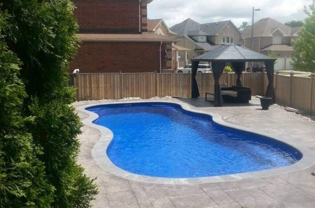 Free form backyard pool design Barrie Ontario